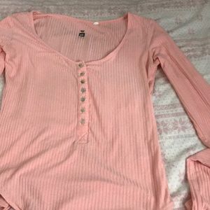 A pacsun, long sleeve, pink body suit